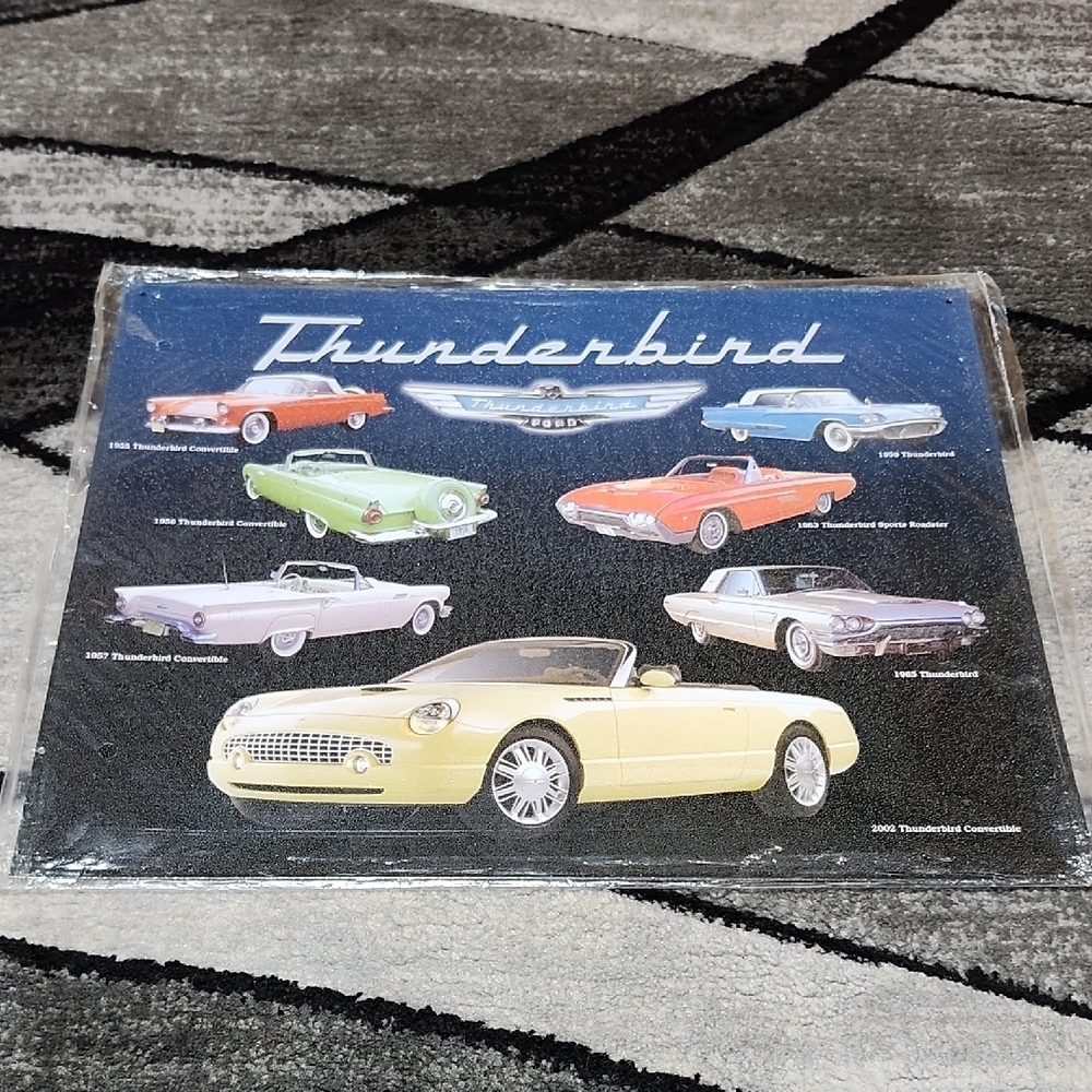 VINTAGE FORD THUNDERBIRD CONVERTIBLE 1955 TO 2002 GENERATIONS PRODUCED TIN SIGN